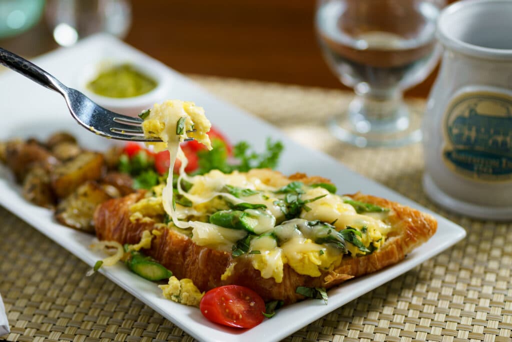 Croissant with eggs and cheese