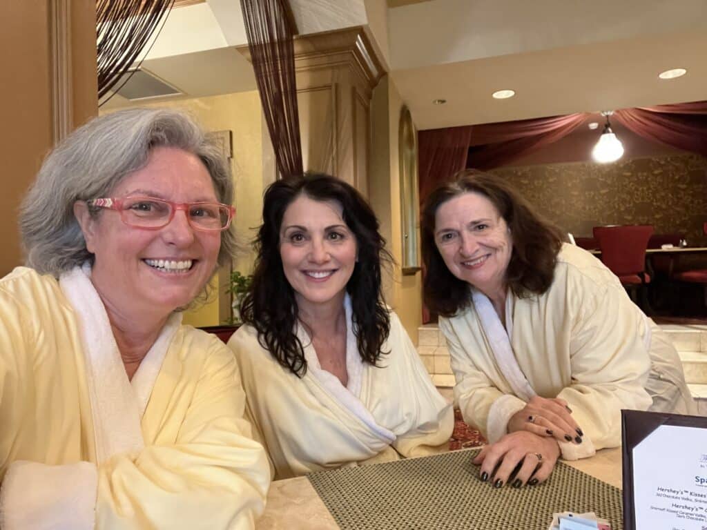 women in spa robes