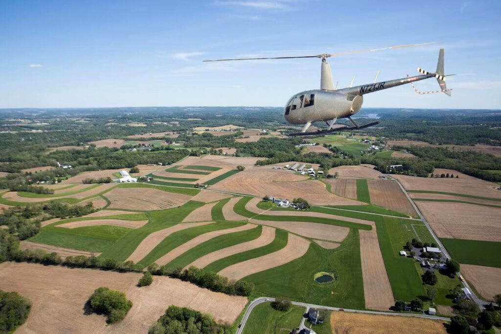 Helicopter over farmland