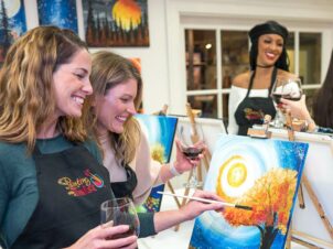 women with wine and art