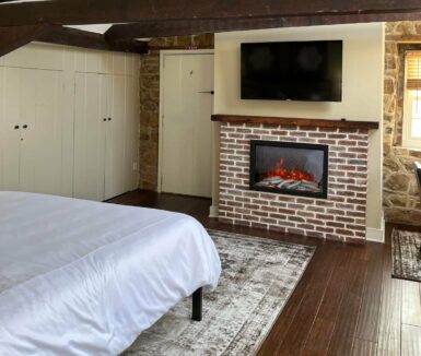 Fireplace and bed