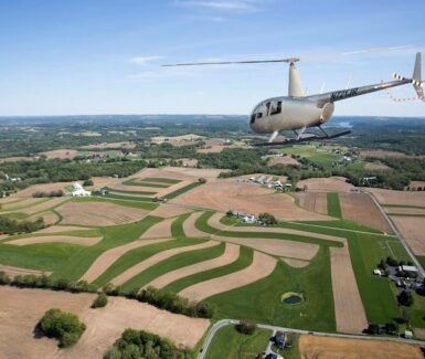 Helicopter over farmland